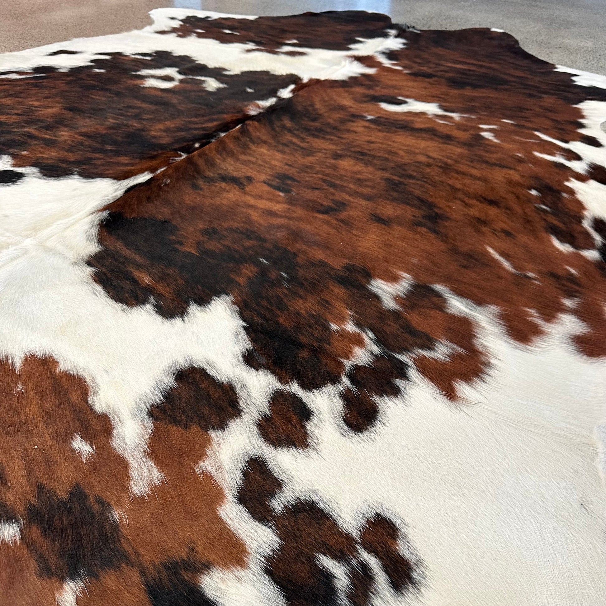 Large Premium Cowhide Rug in Brown, Black and White