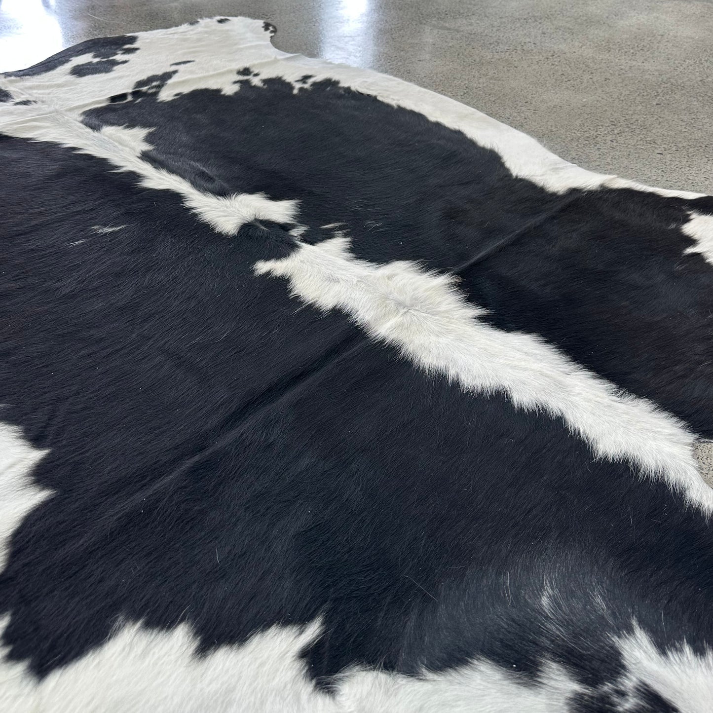 Large premium cowhide rug in black and white. Black Hereford