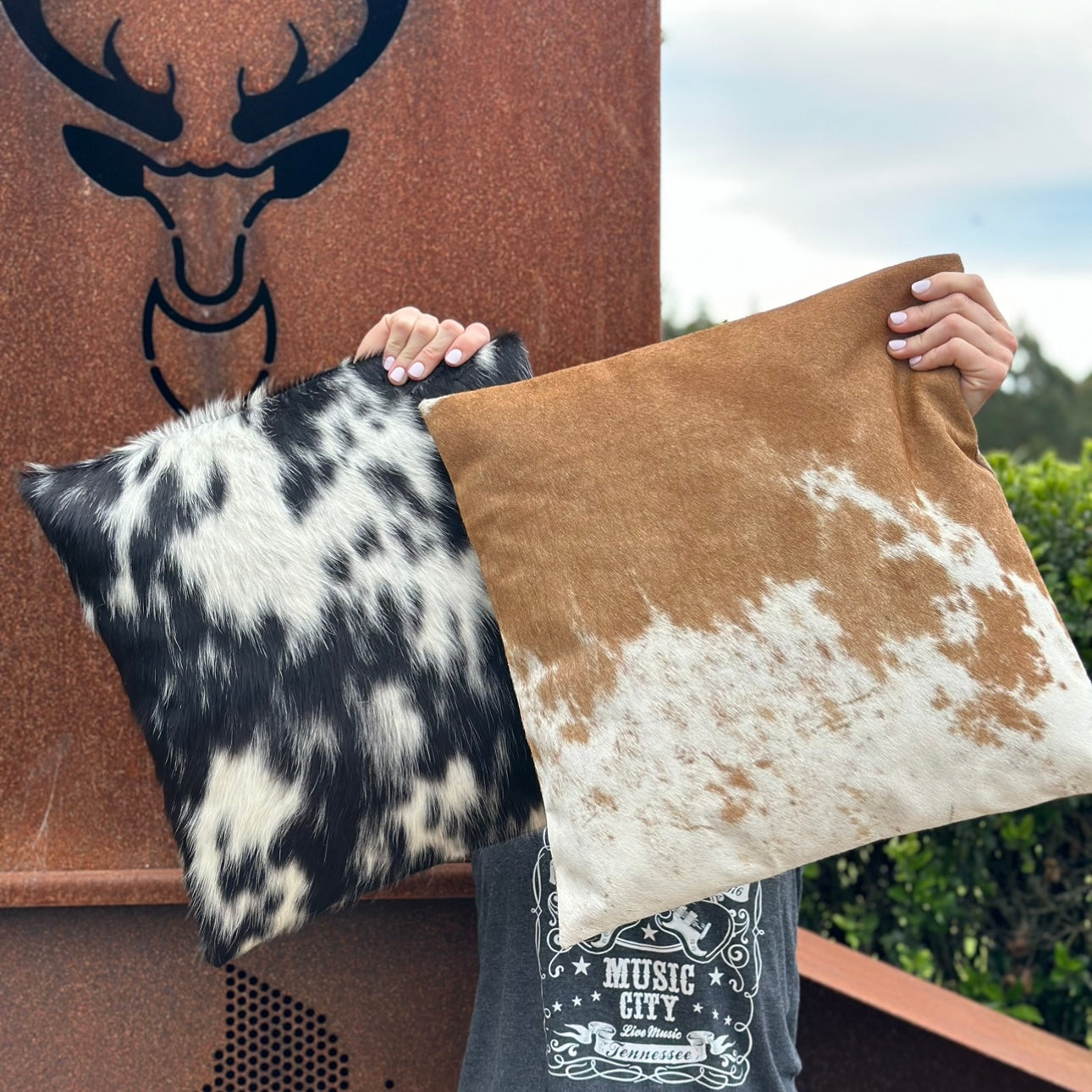 Cowhide cushion in black & white and tan & white