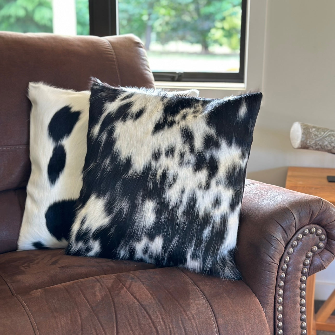 Cowhide cushion in black and white