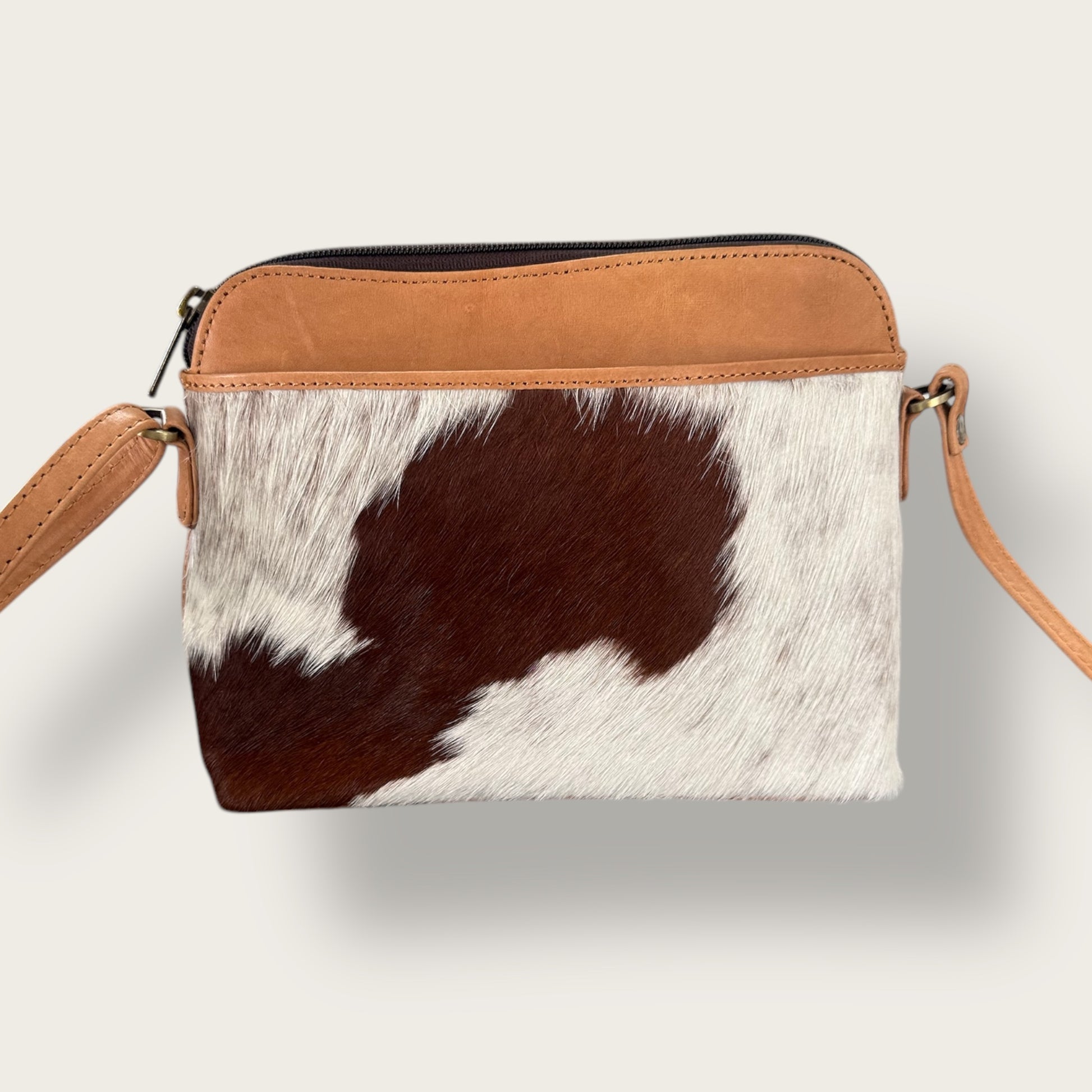 Cowhide and leather crossbody bag in tan & white