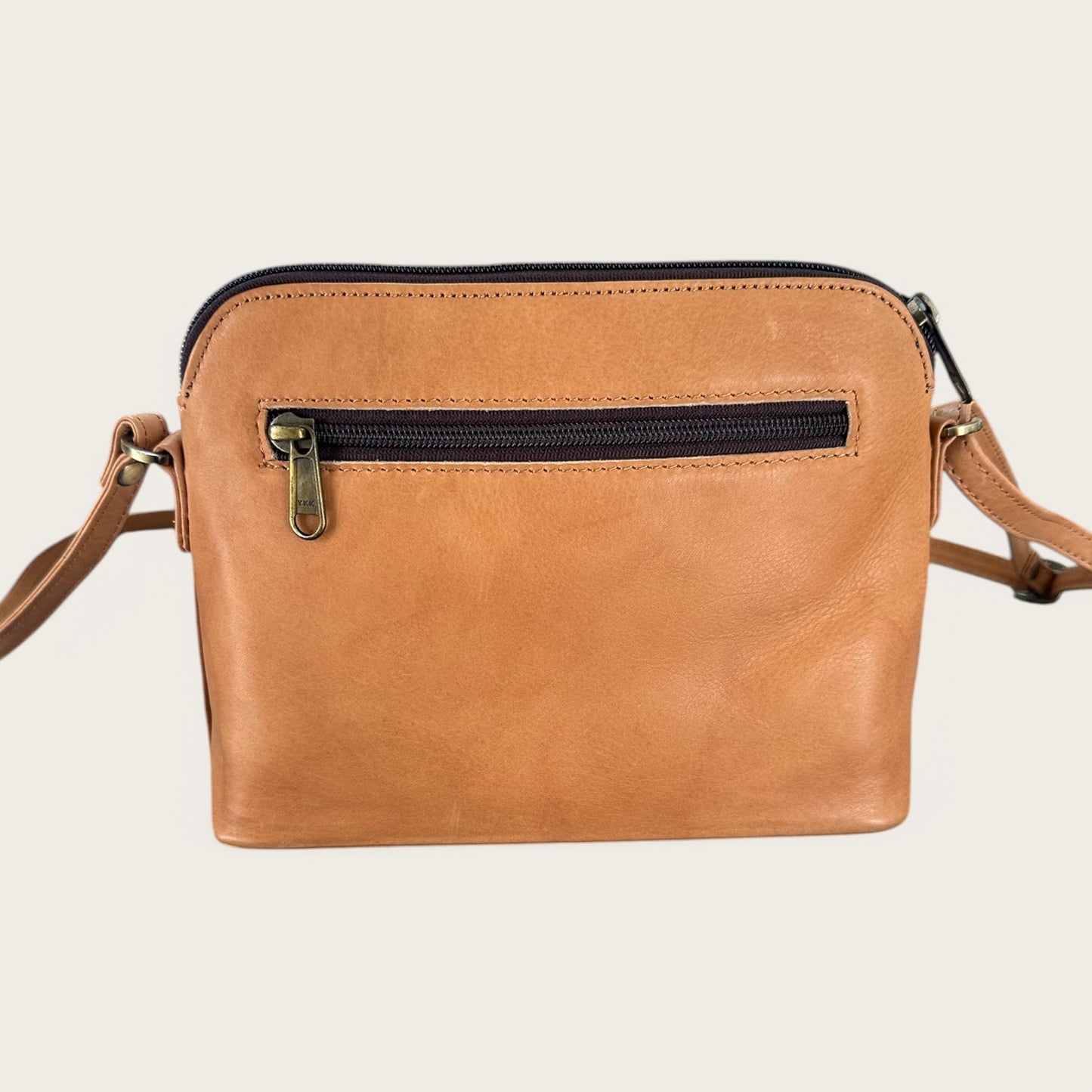 Cowhide and leather crossbody bag in tan & white