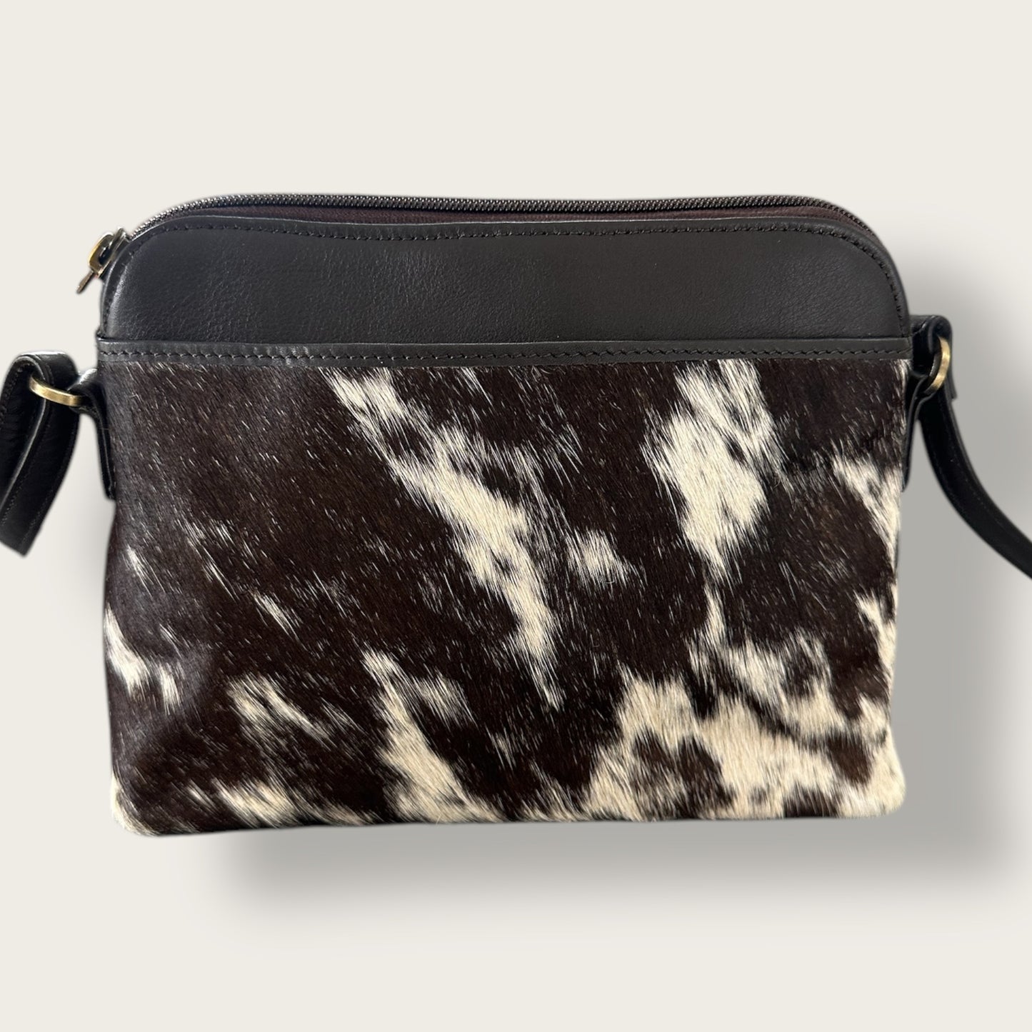 Cowhide and leather crossbody bag in brown & white