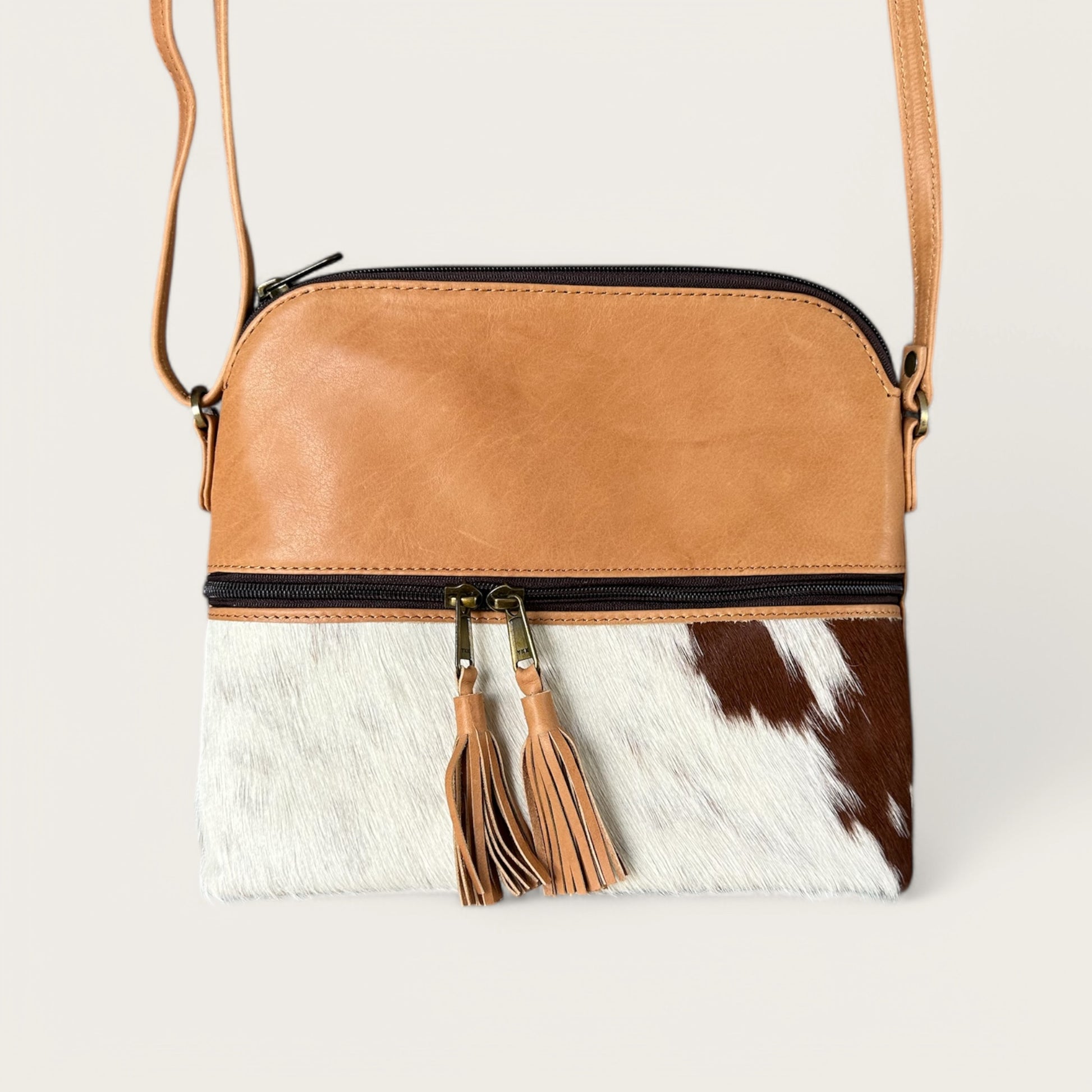 Large cowhide and leather crossbody bag in tan & white