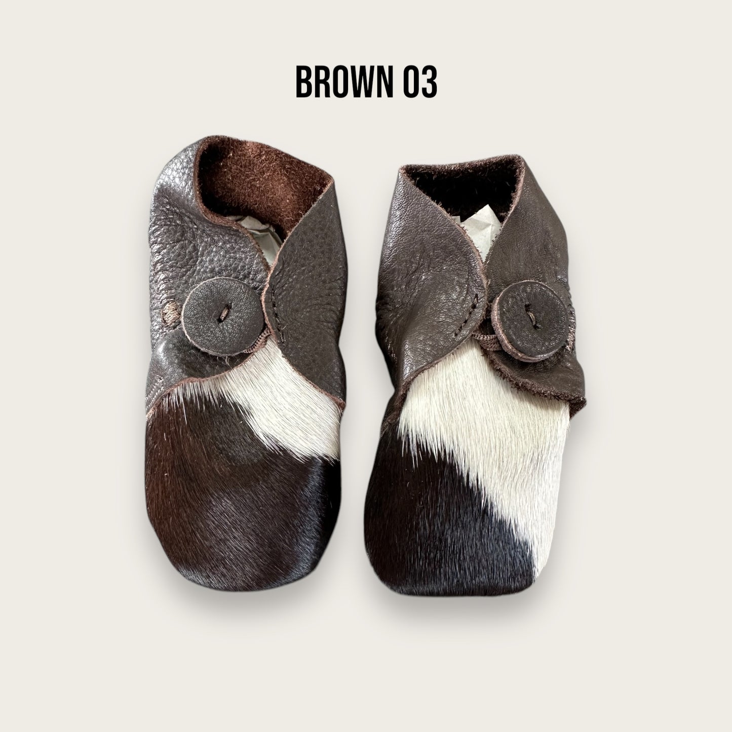 Brown and White Cowhide Booties