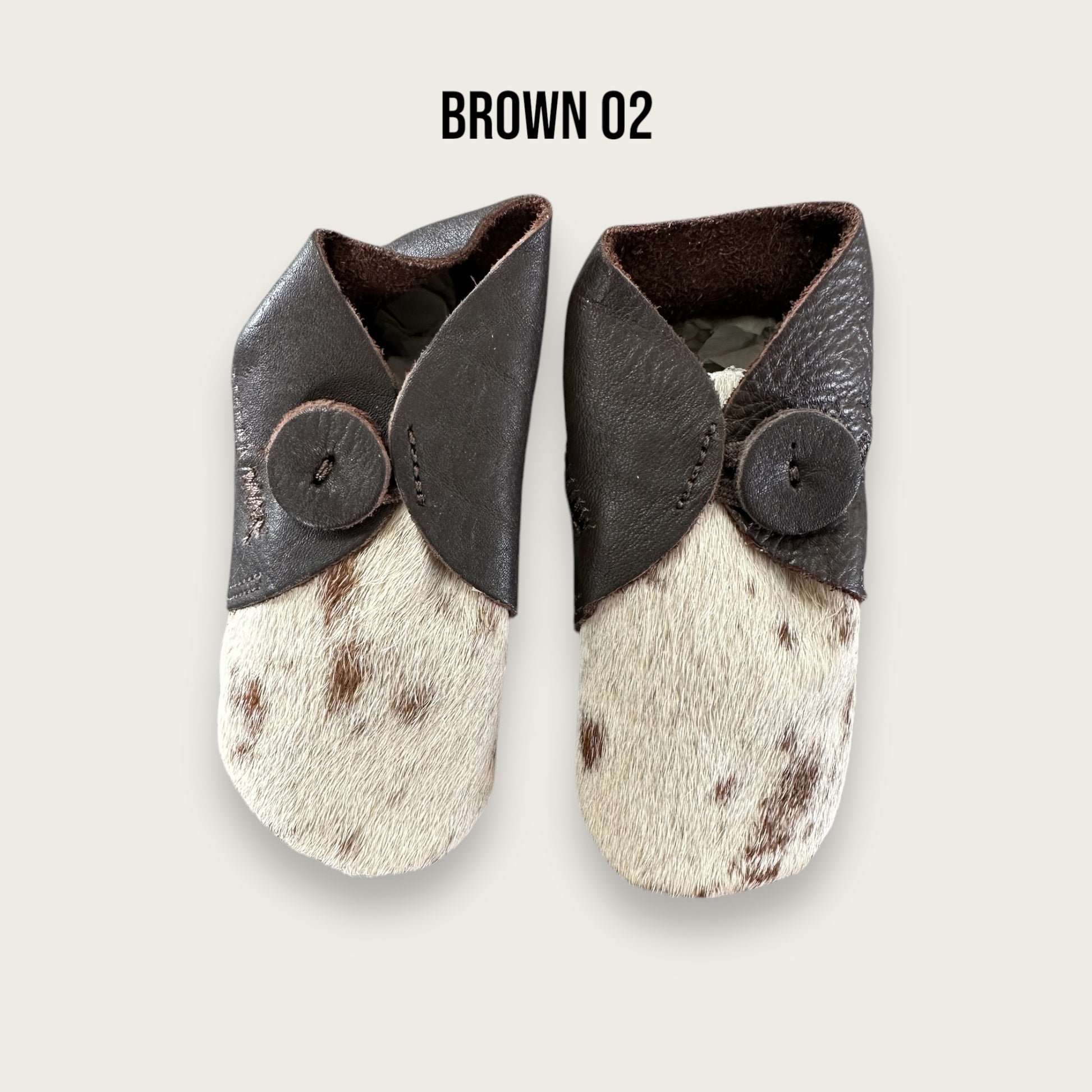 Brown and White Cowhide Booties