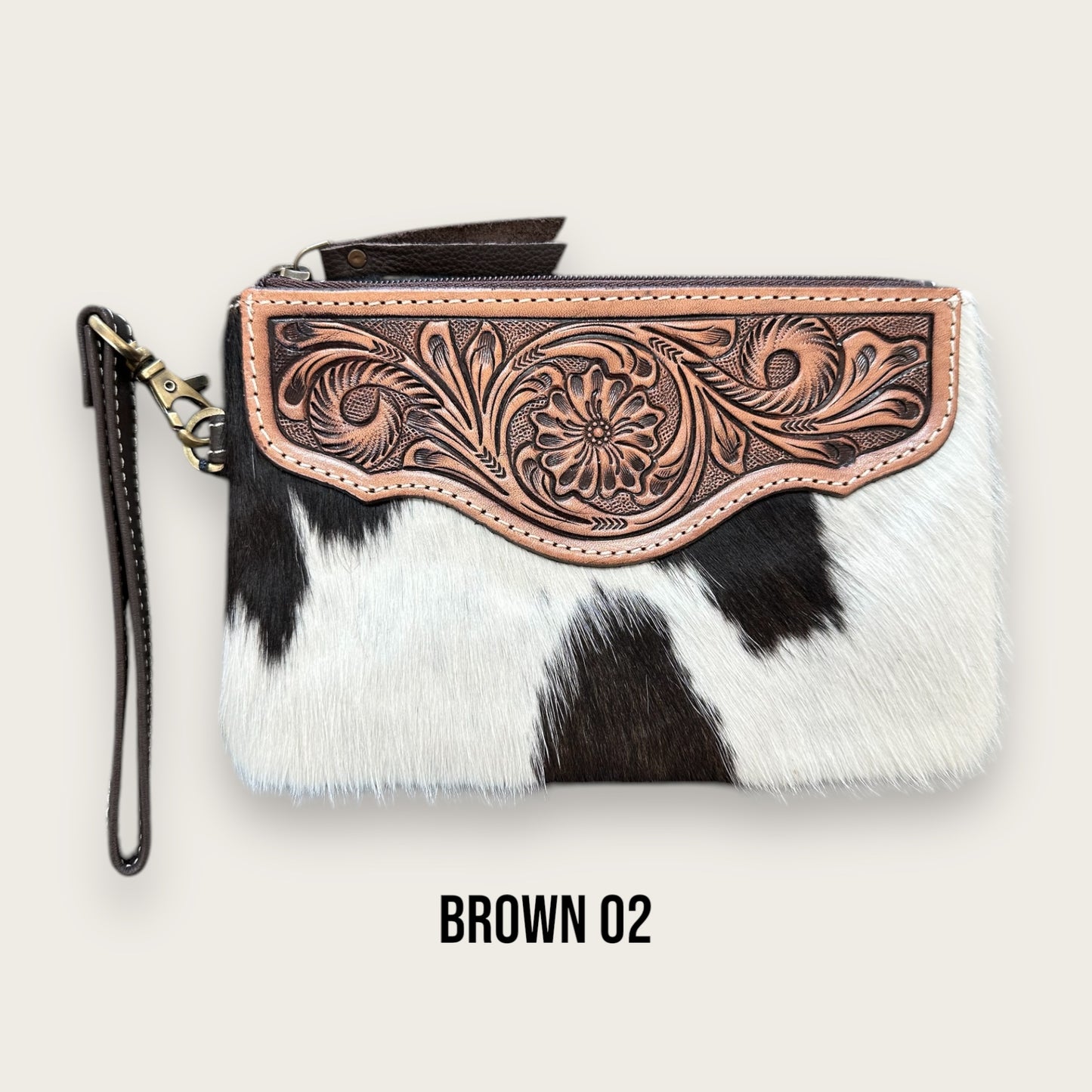 Brown and White Cowhide and Leather Clutch with Tooling Details