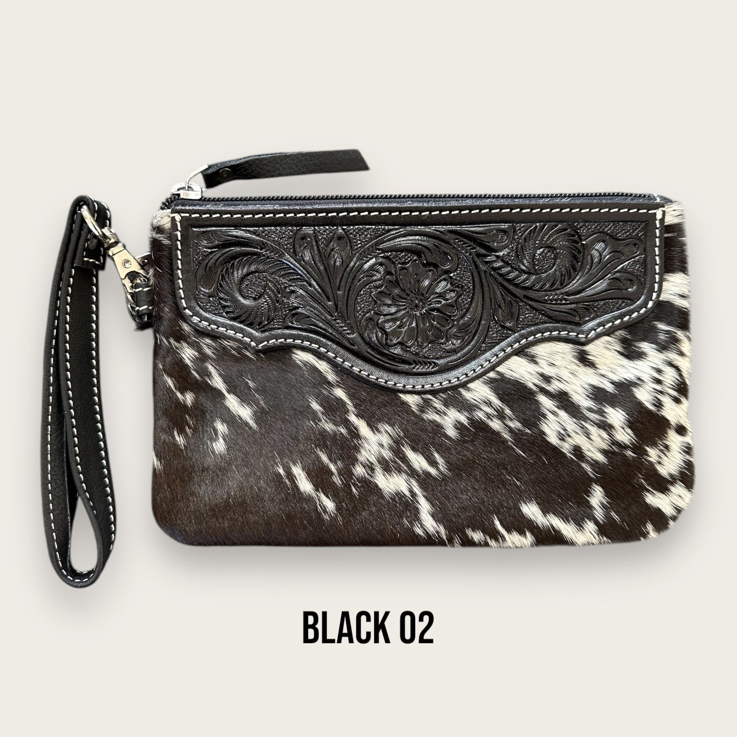Black and White Cowhide and Leather Clutch with Tooling Details