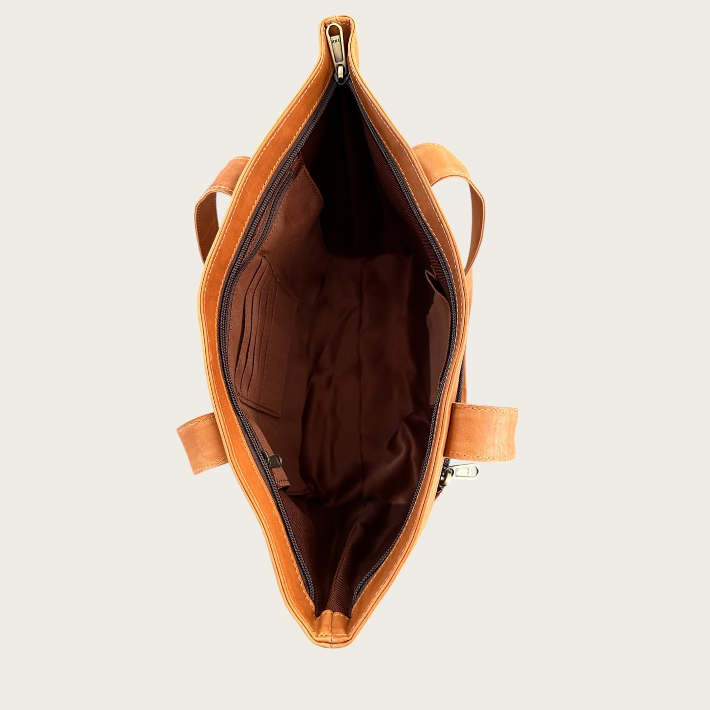 Large cowhide and leather tote in tan