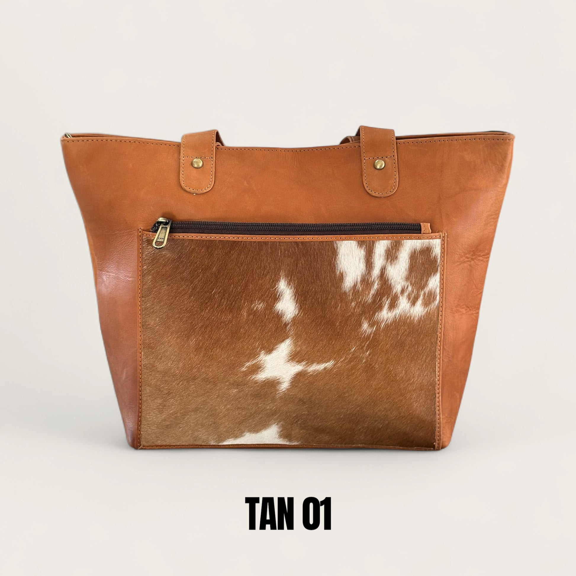 Large cowhide and leather tote in tan