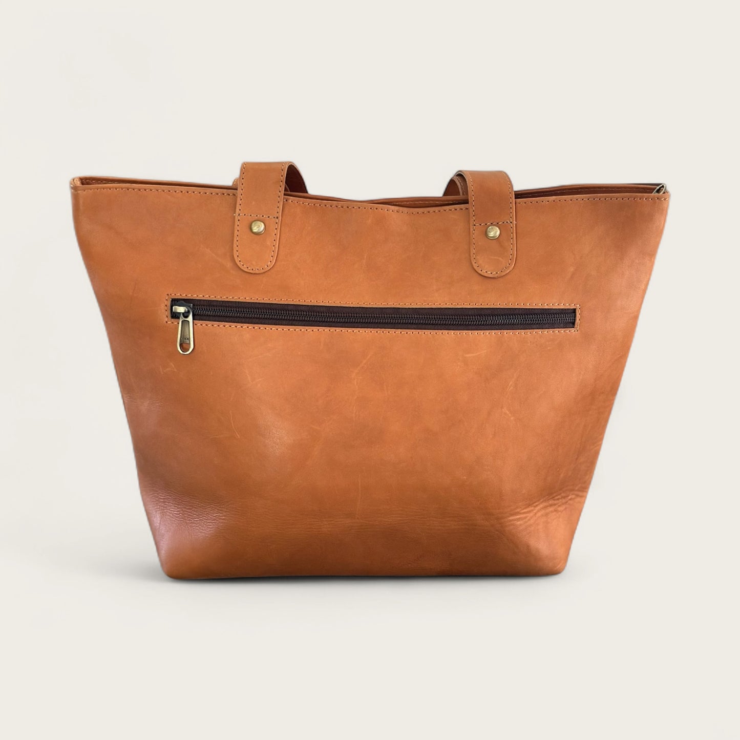 Large cowhide and leather tote in tan