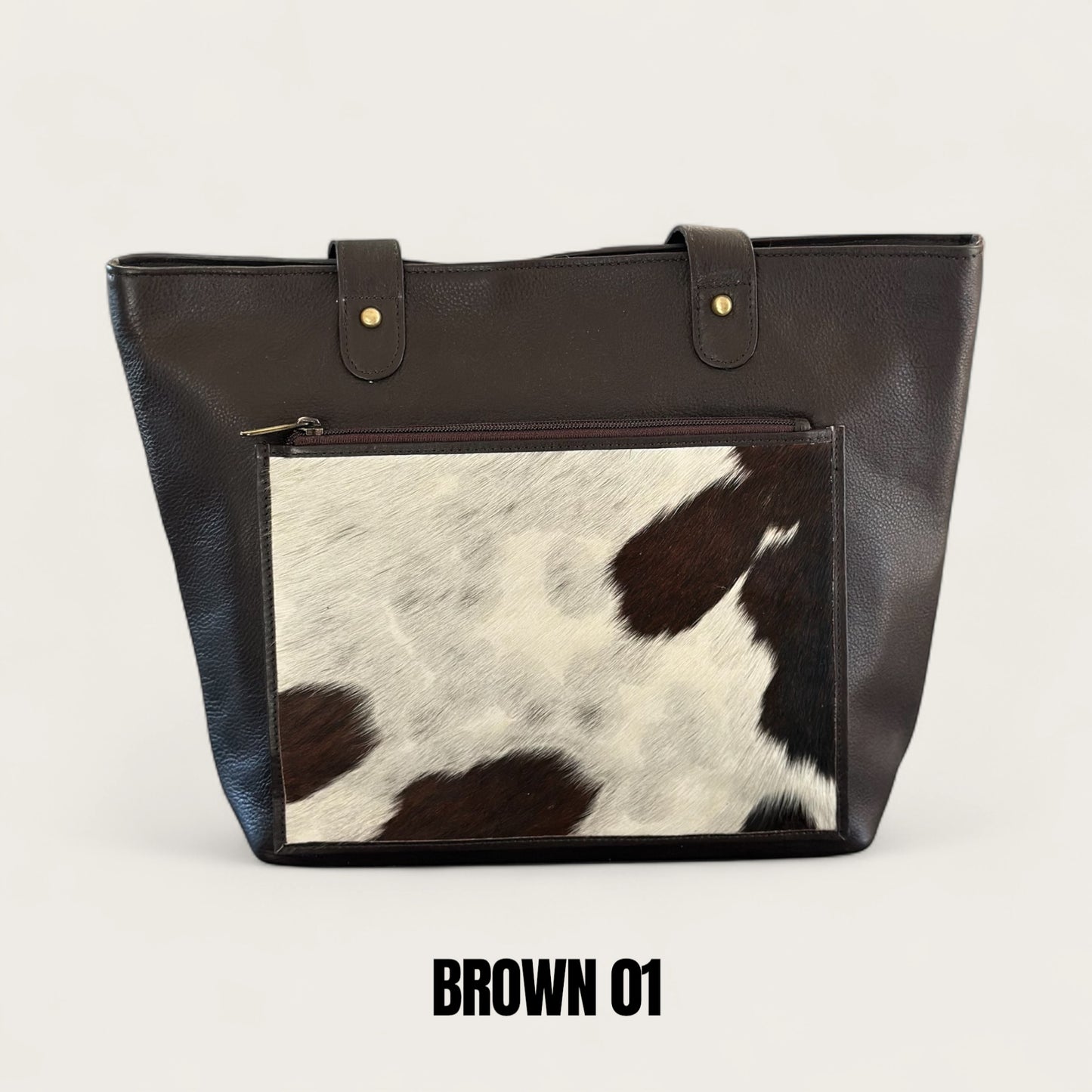 Large cowhide and leather tote in brown