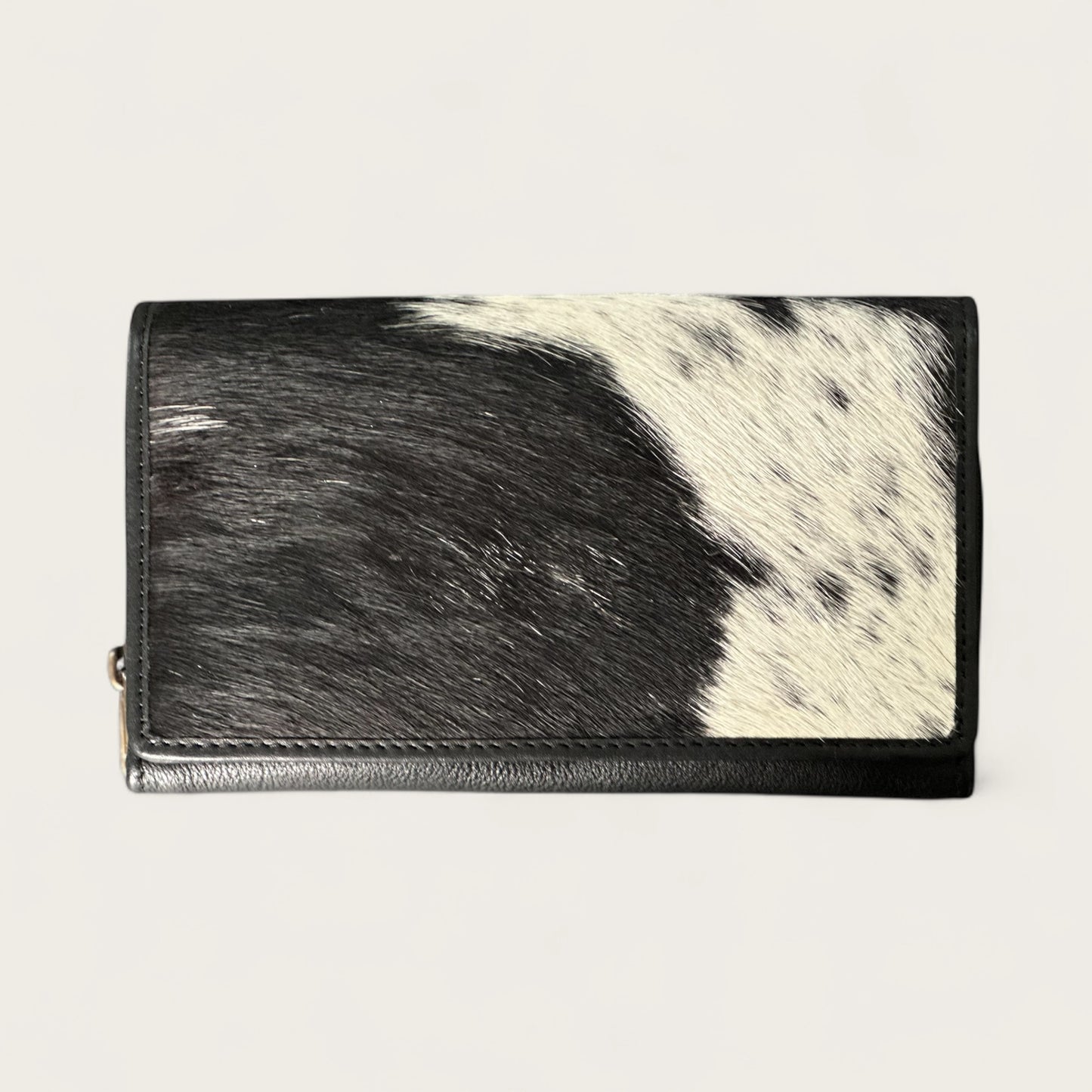 Cowhide and leather wallet in black and white