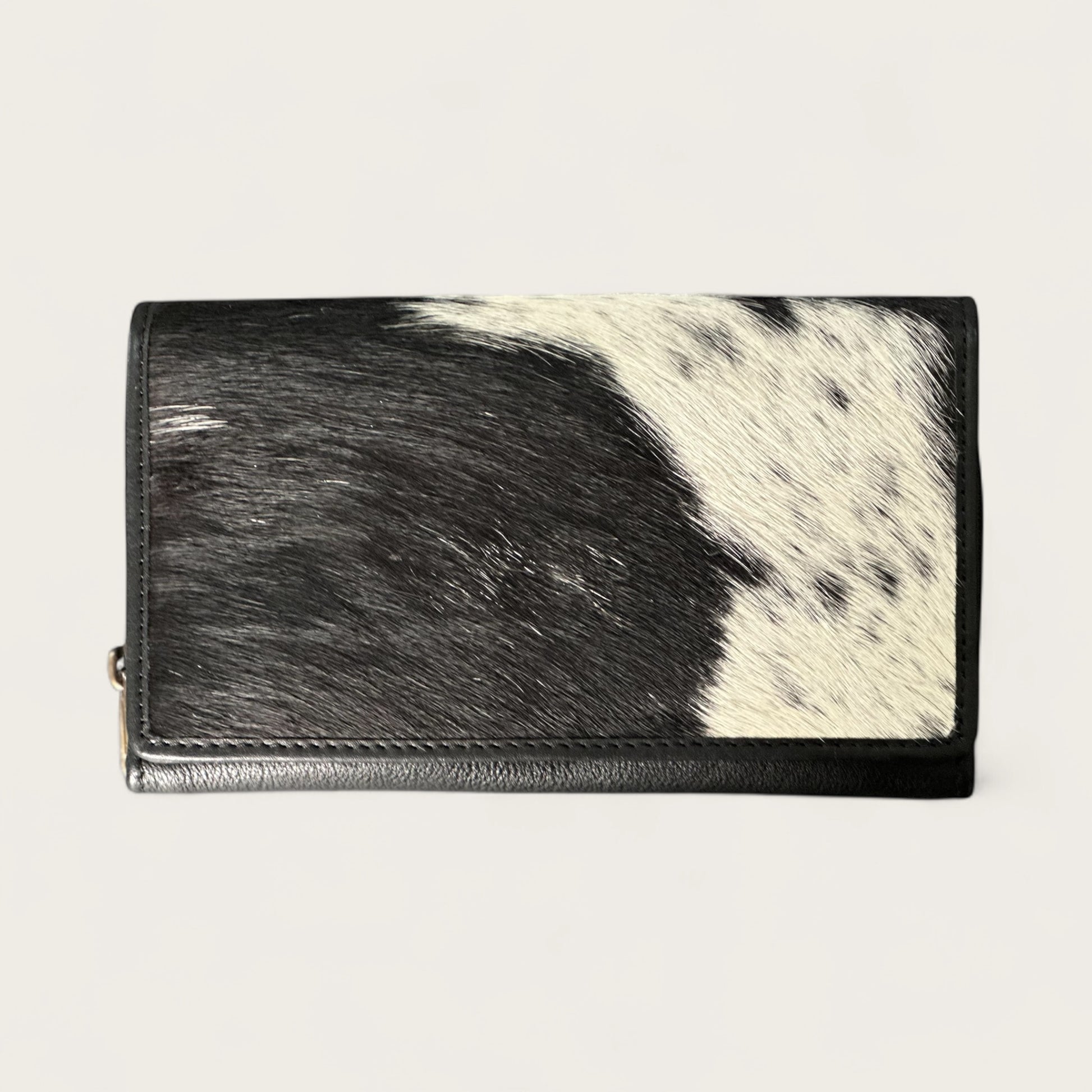 Cowhide and leather wallet in black and white