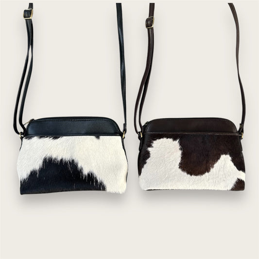 Cowhide and leather crossbody bag in black & white and brown & white