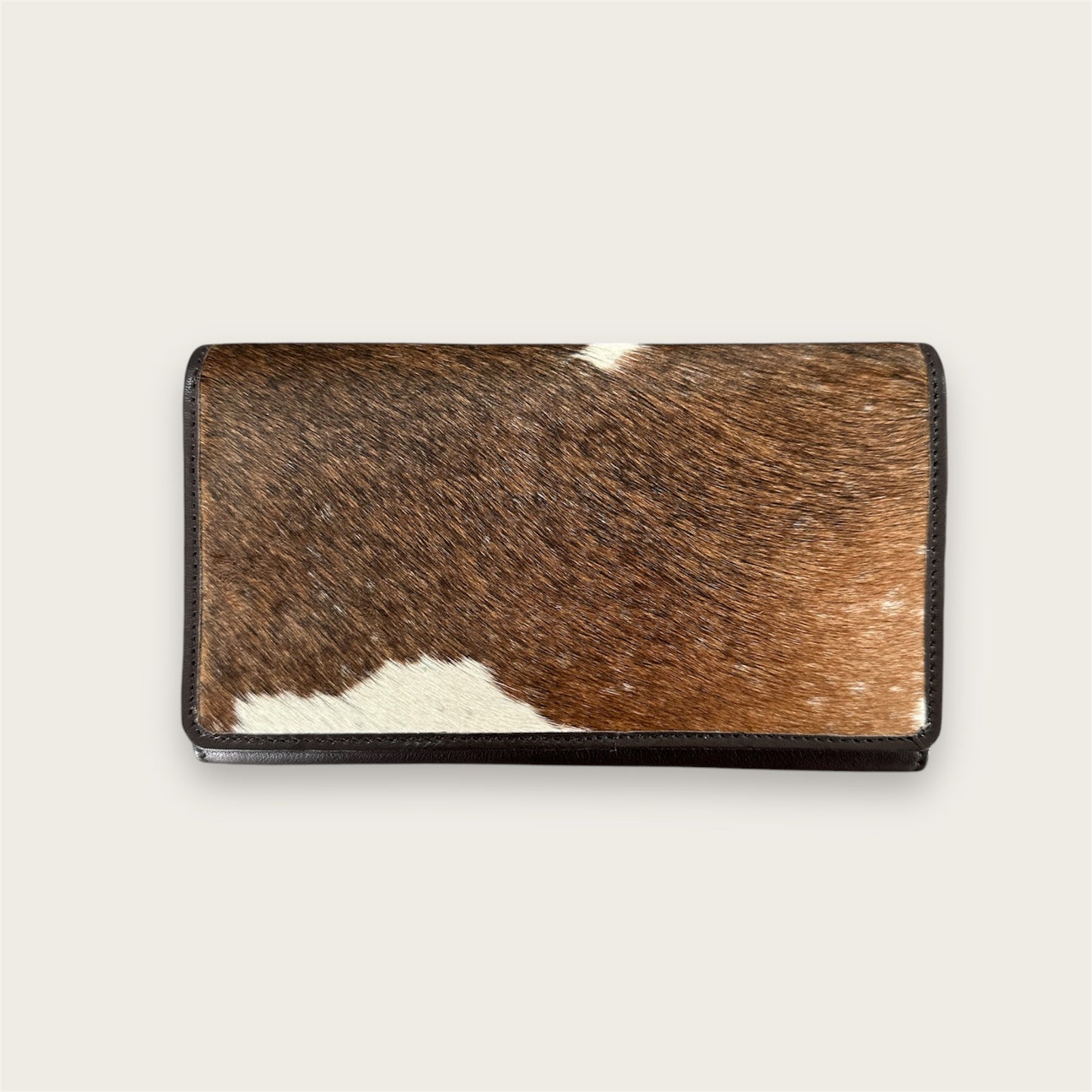 Large leather and cowhide wallet in brown and white