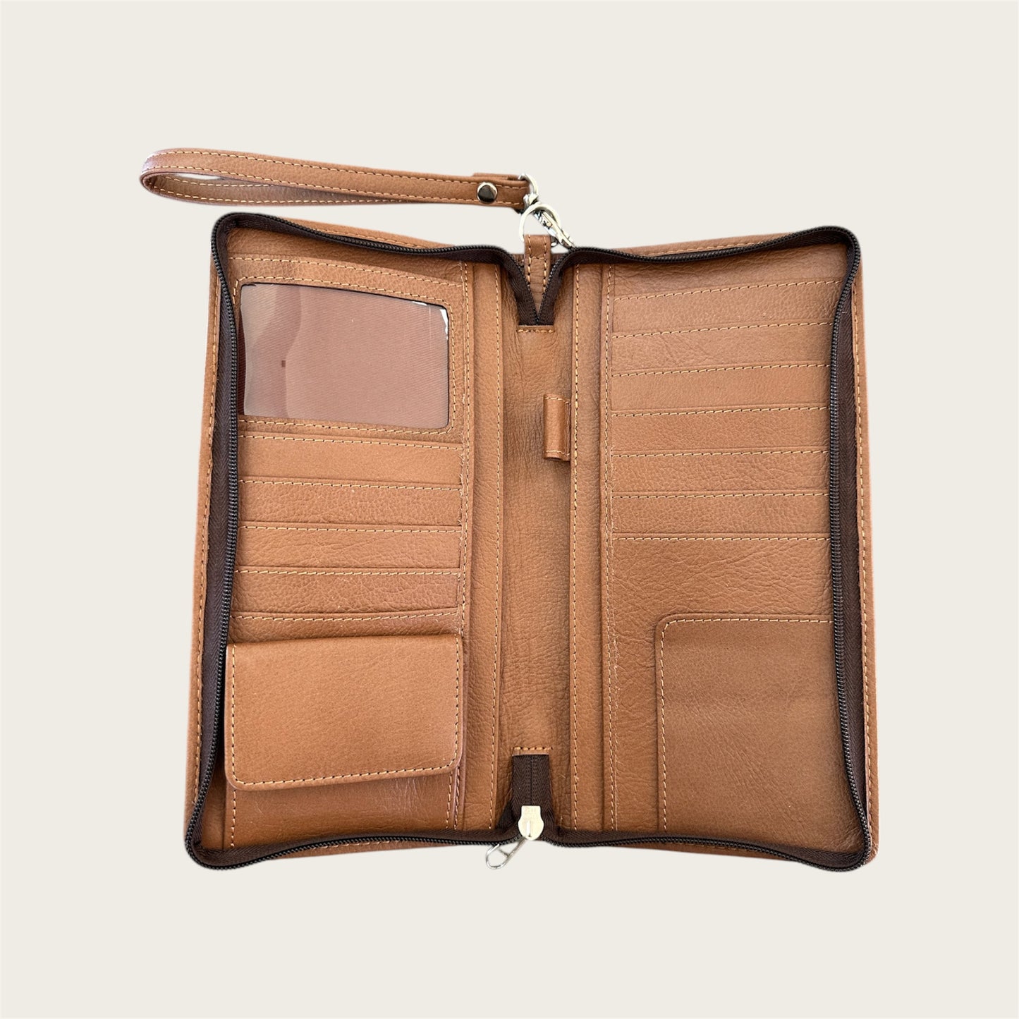 Large leather travel wallet in tan