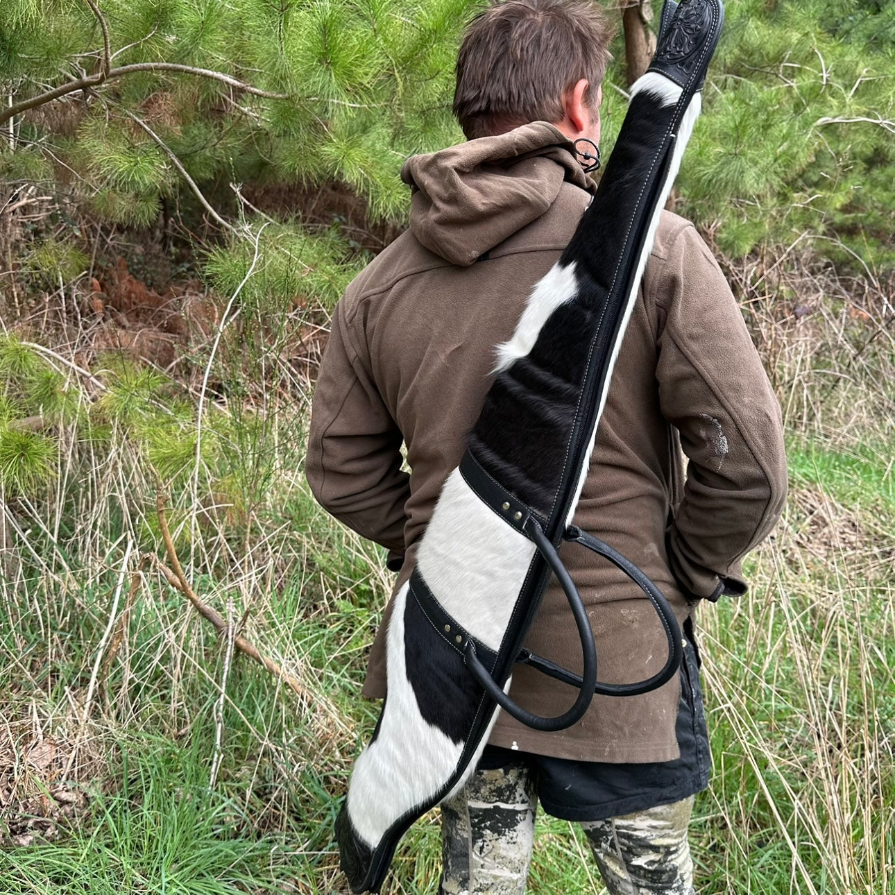 Cowhide and Leather Rifle Gun Bag with Tooling Details in Black and White