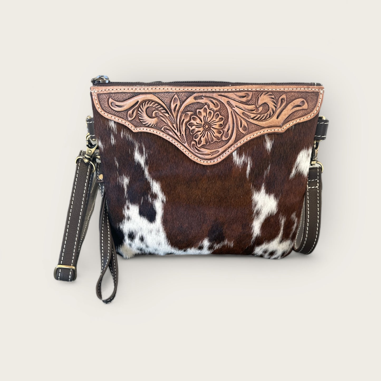 Cowhide and Leather Handbag with crafted tooling details in Brown and White