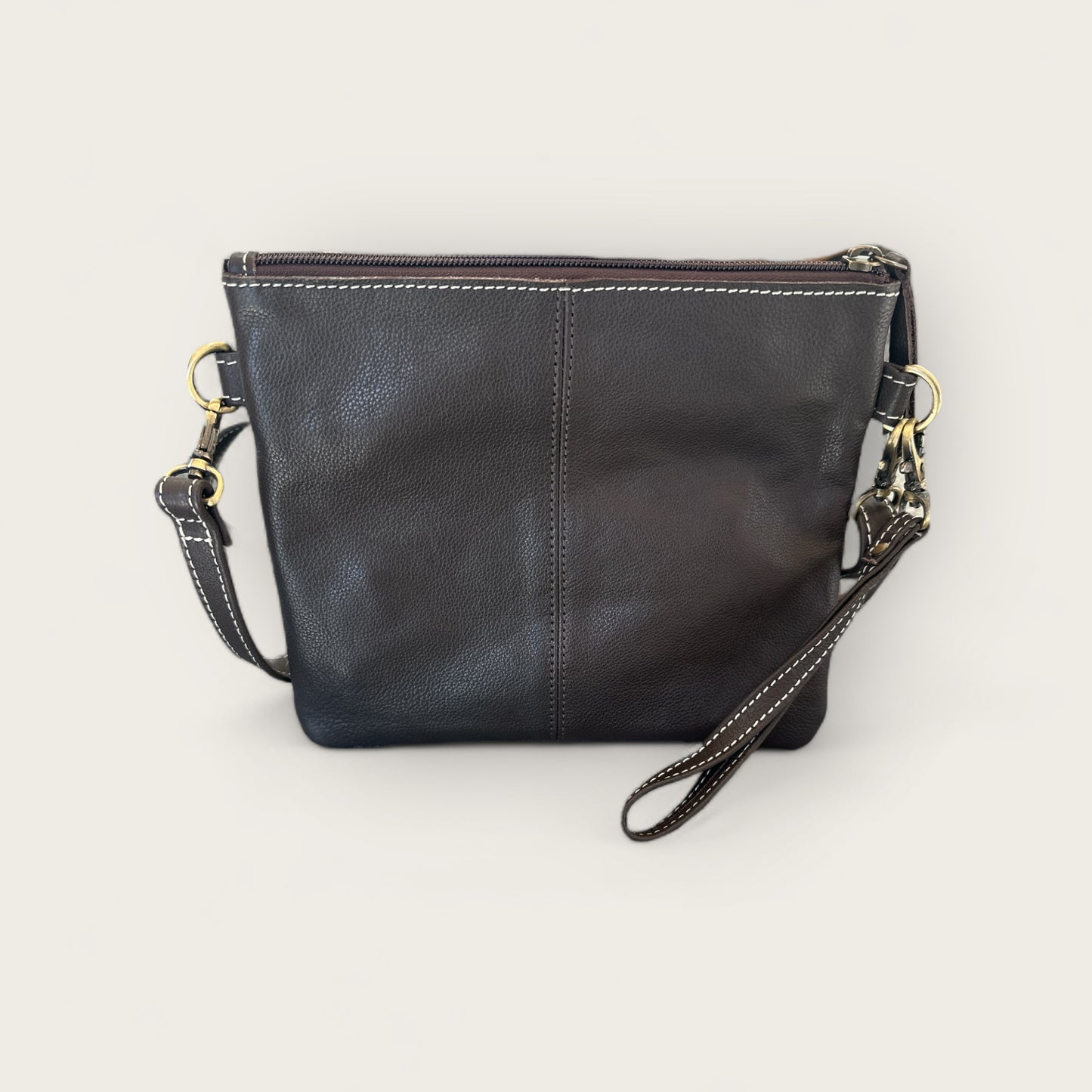 Cowhide and Leather Handbag with crafted tooling details in Brown and White