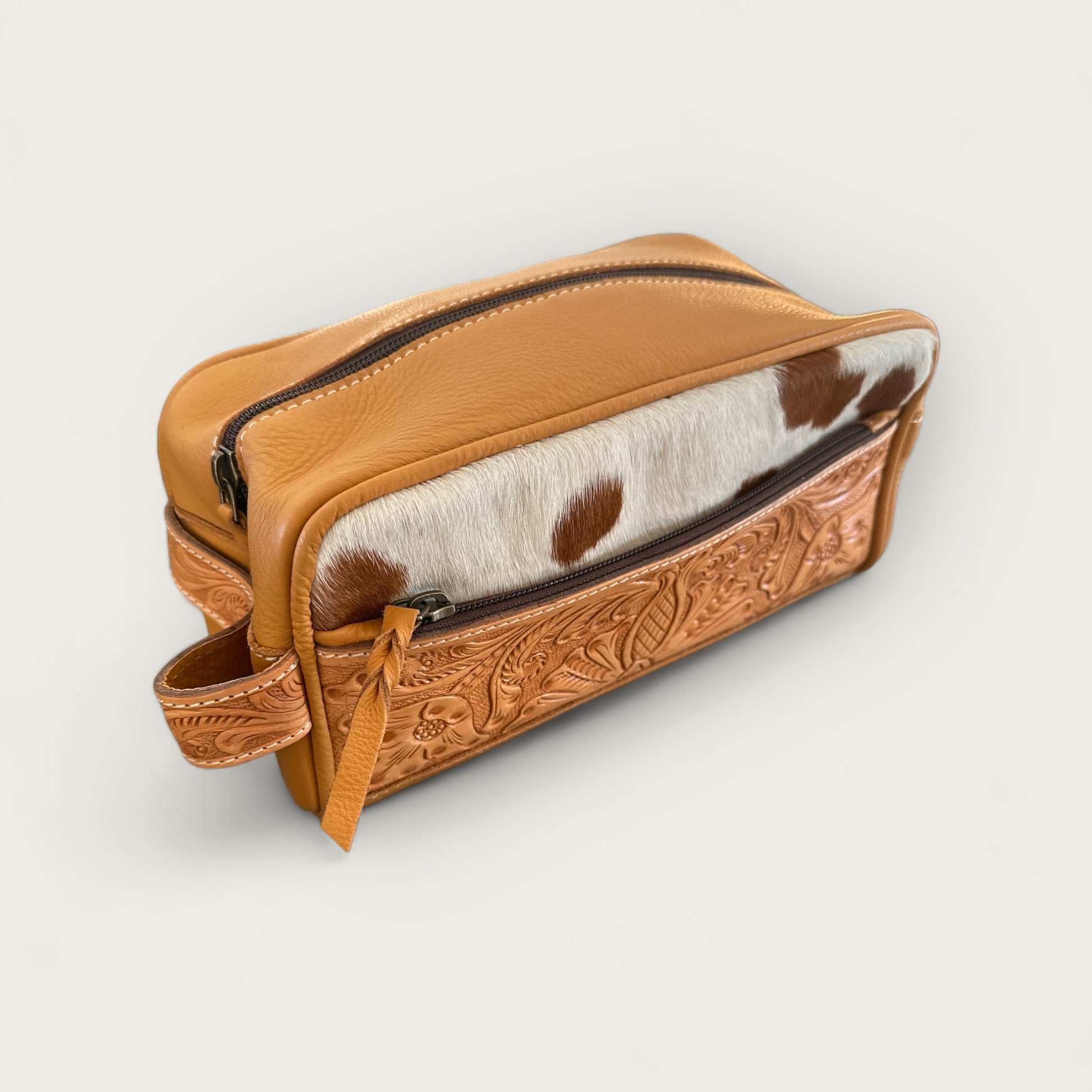 Cowhide and Leather Toiletry Bag with Tooling Details in Tan and White