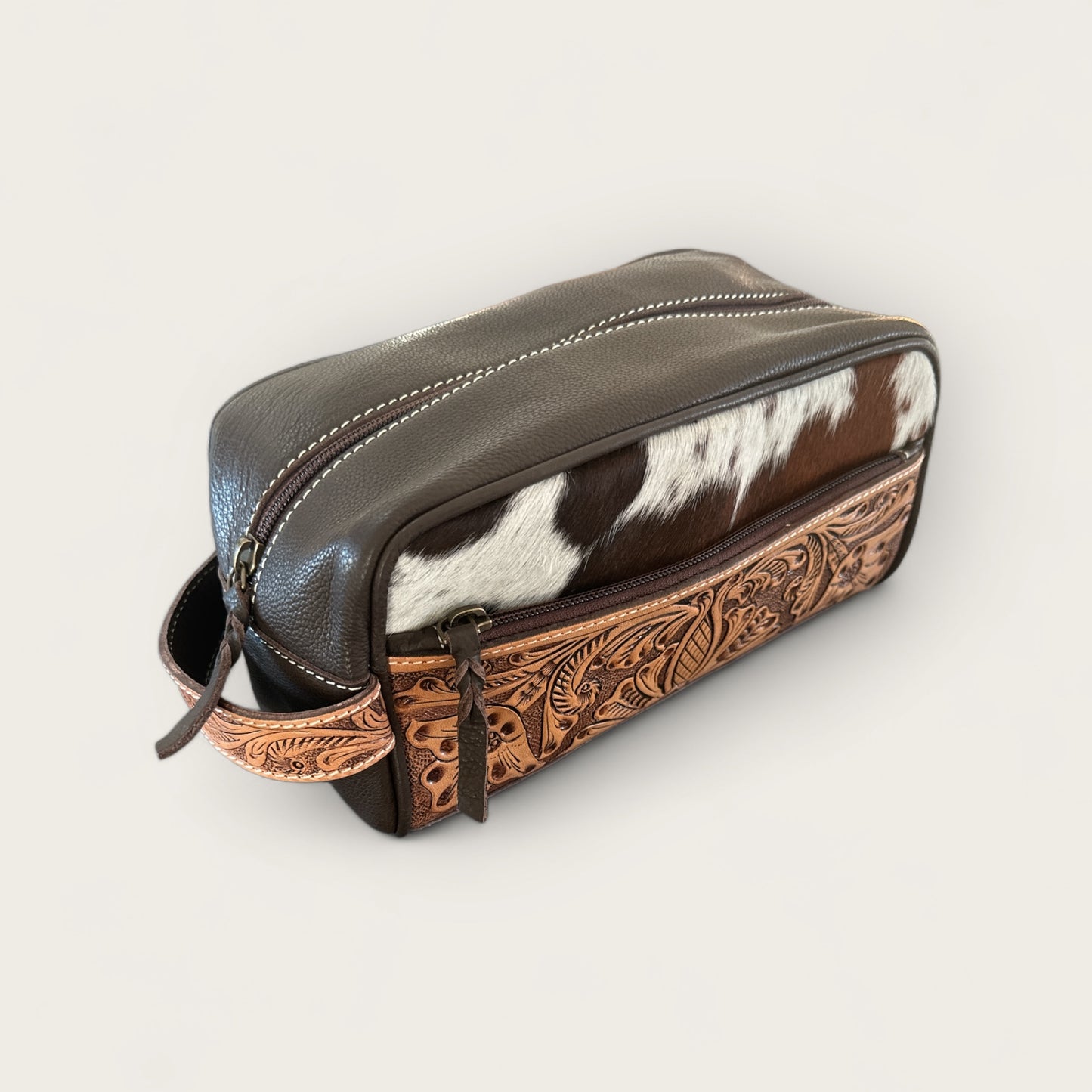 Cowhide and Leather Toiletry Bag with Tooling Details in Brown and White