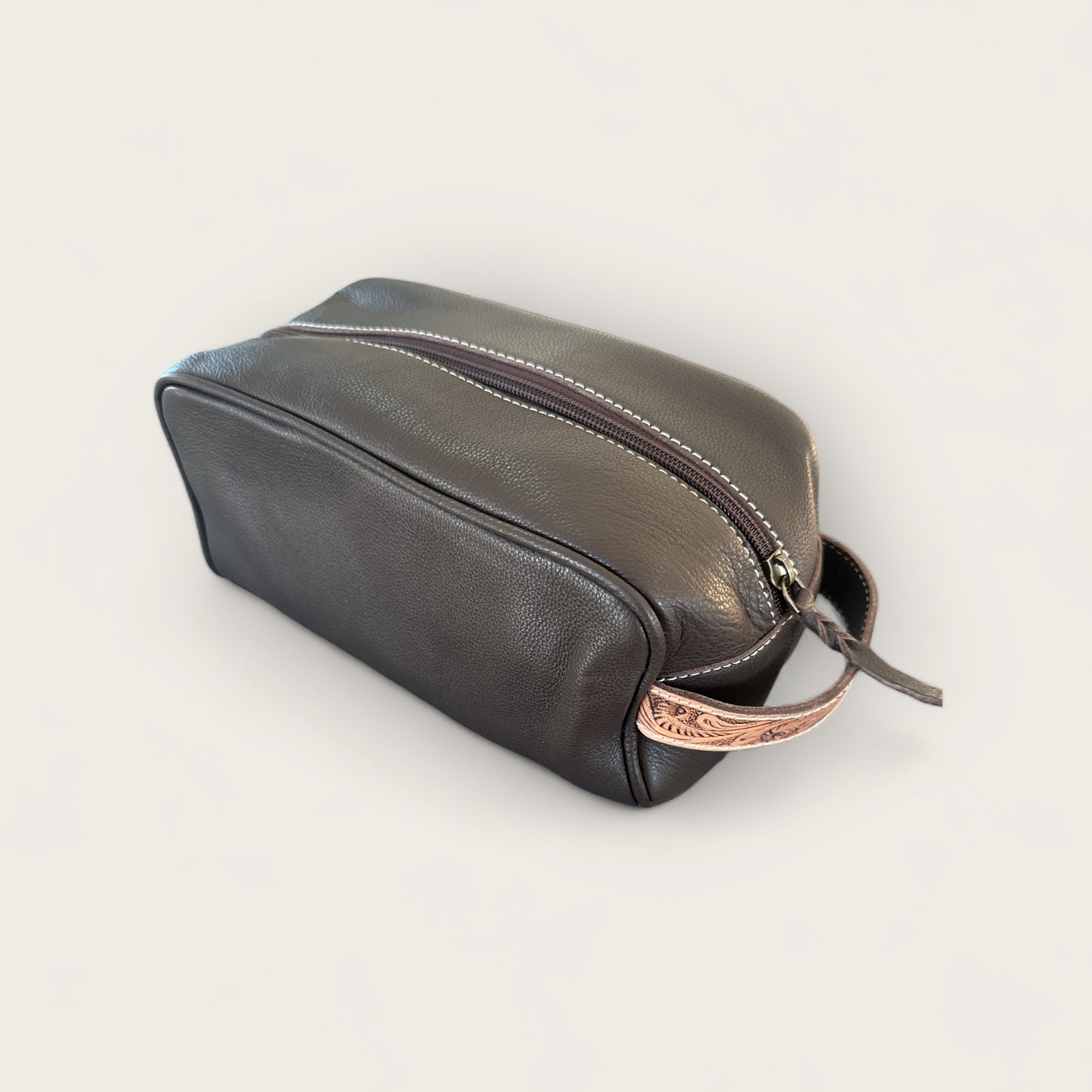 Cowhide and Leather Toiletry Bag with Tooling Details in Brown and White