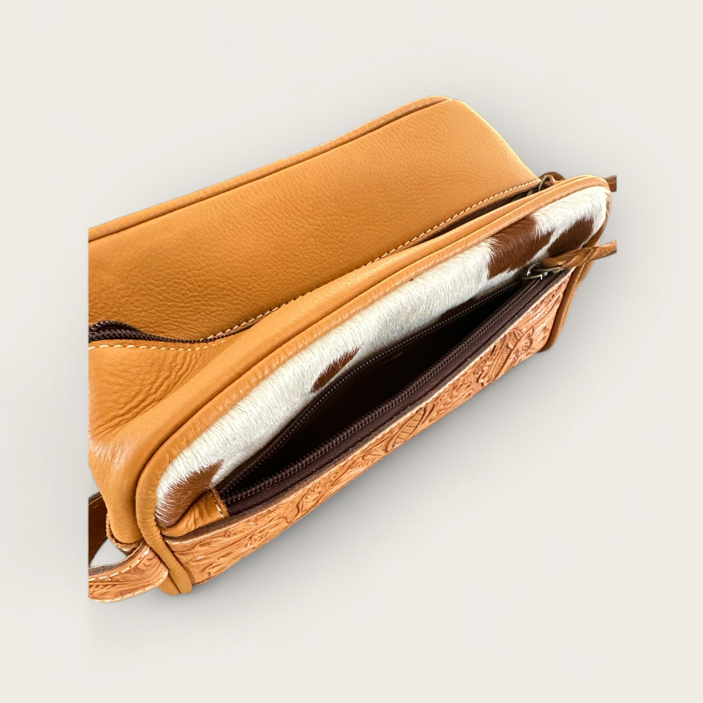 Cowhide and Leather Toiletry Bag with Tooling Details in Tan and White