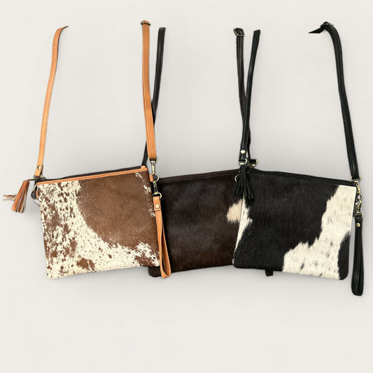 Cowhide and leather handbag or clutch