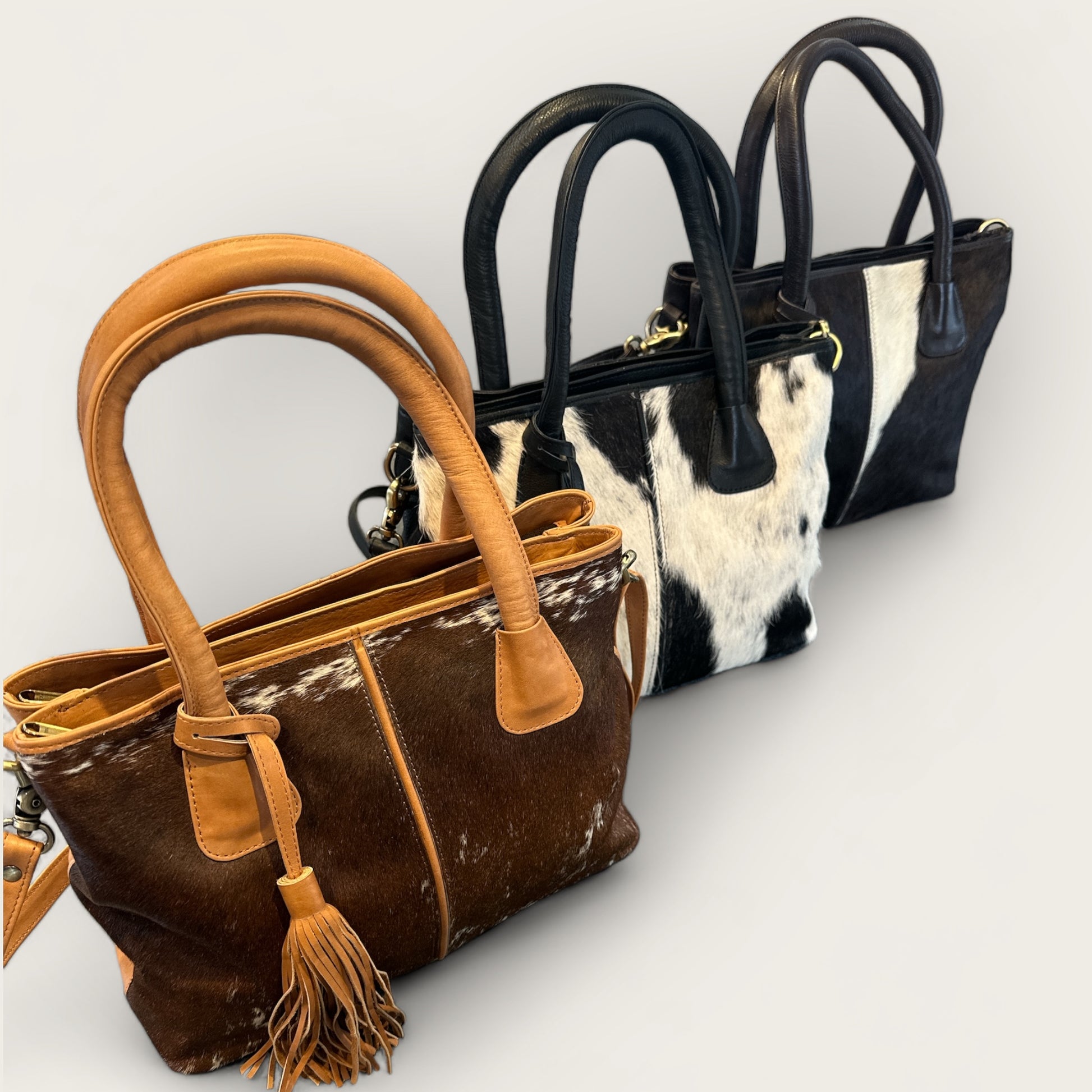 Large Cowhide Handbag with Leather