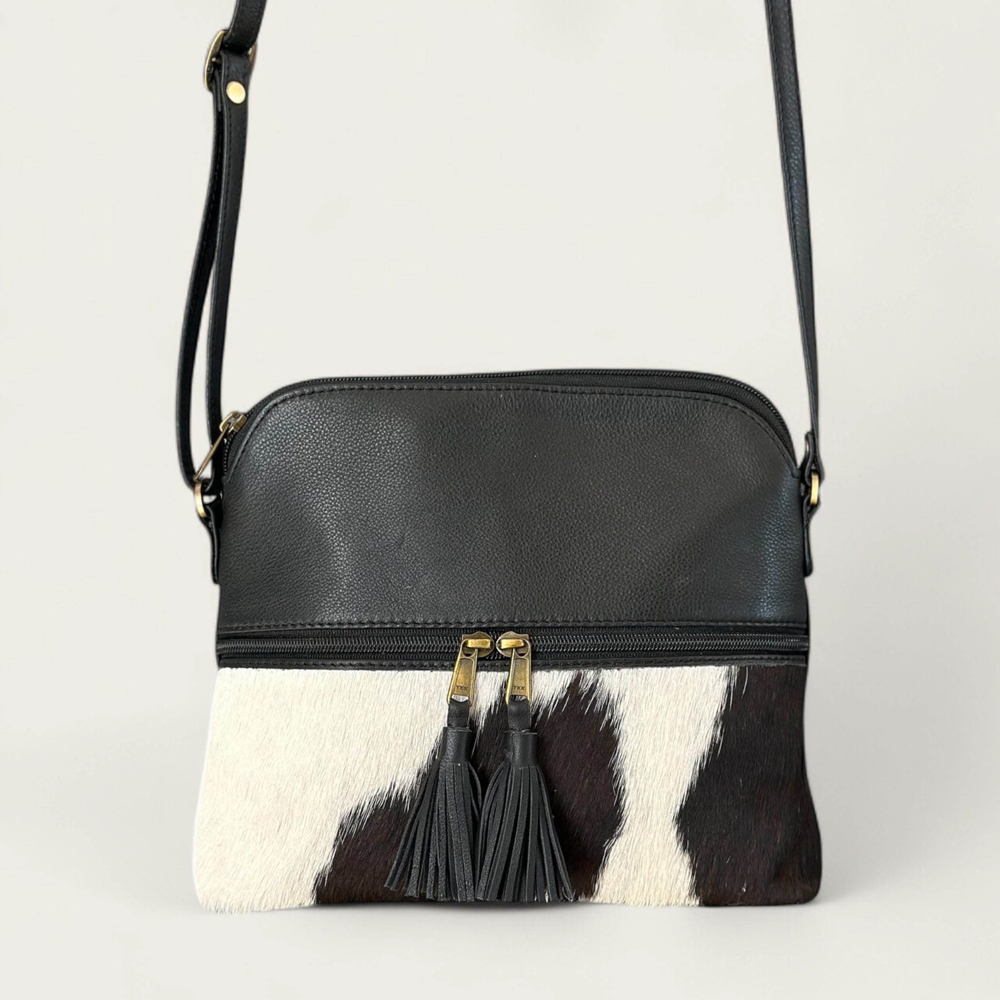 Large cowhide and leather crossbody bag in black & white 