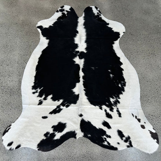 Large premium cowhide rug in black and white. Black Hereford