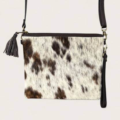 Cowhide and leather handbag or clutch in brown