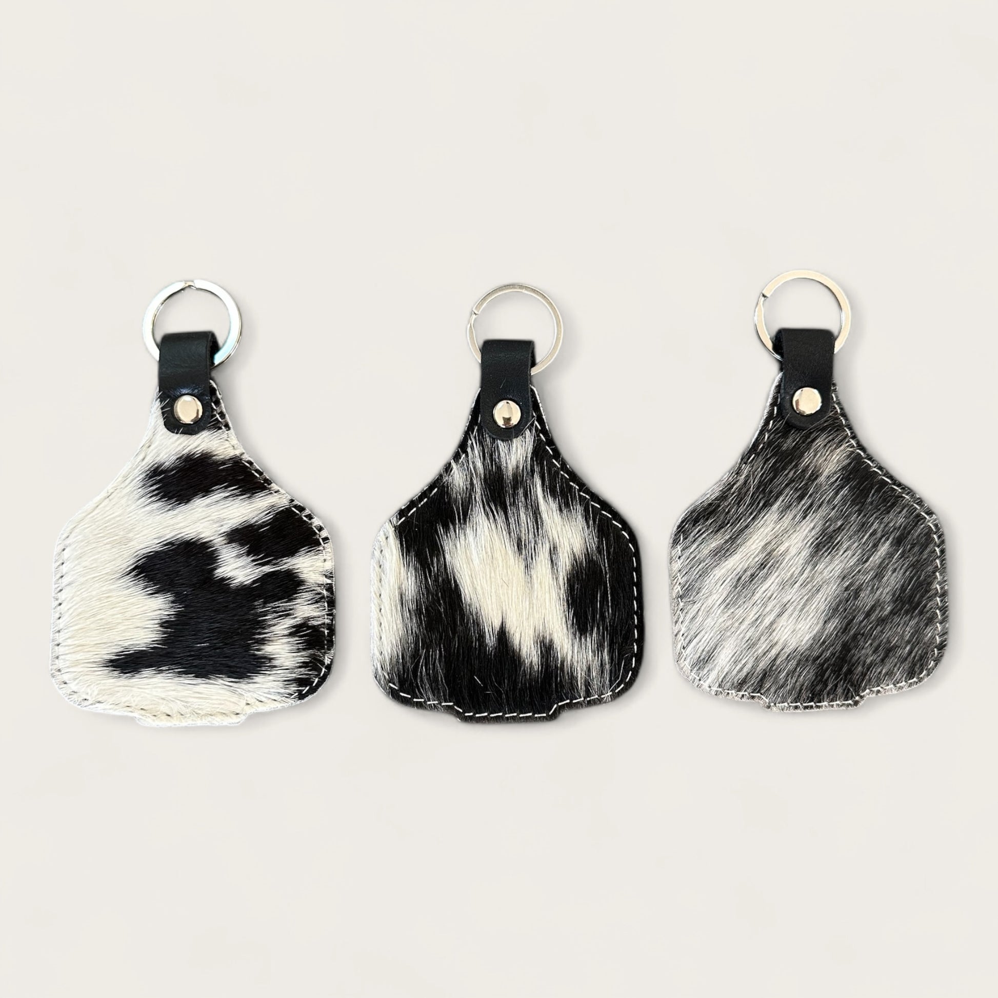 Extra large cowhide cattle tag keyring in black and white 
