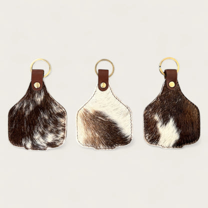 Extra large cowhide cattle tag keyring in brown and white 