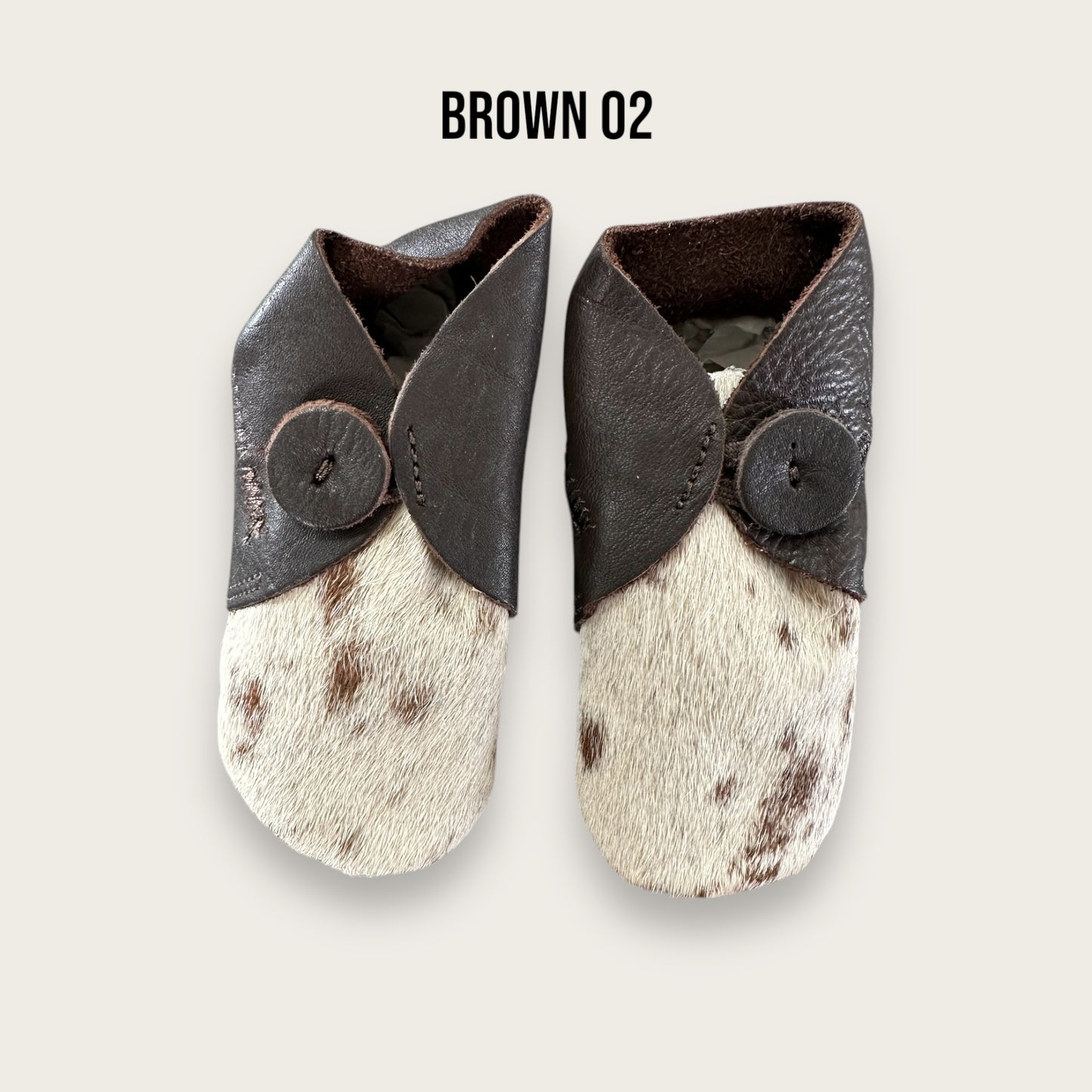 Brown and White Cowhide Booties