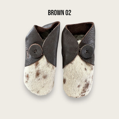 Brown and White Cowhide Booties