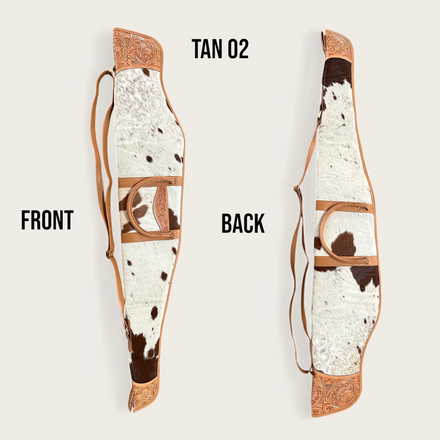 Cowhide and leather rifle gun bag in tan and white with tooling details