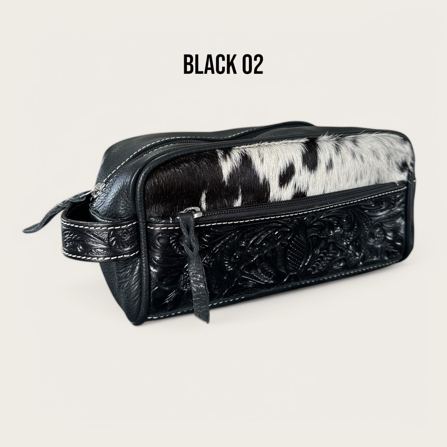 Black and White Cowhide and Leather Toiletry Bag with Tooling Details