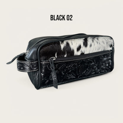 Black and White Cowhide and Leather Toiletry Bag with Tooling Details