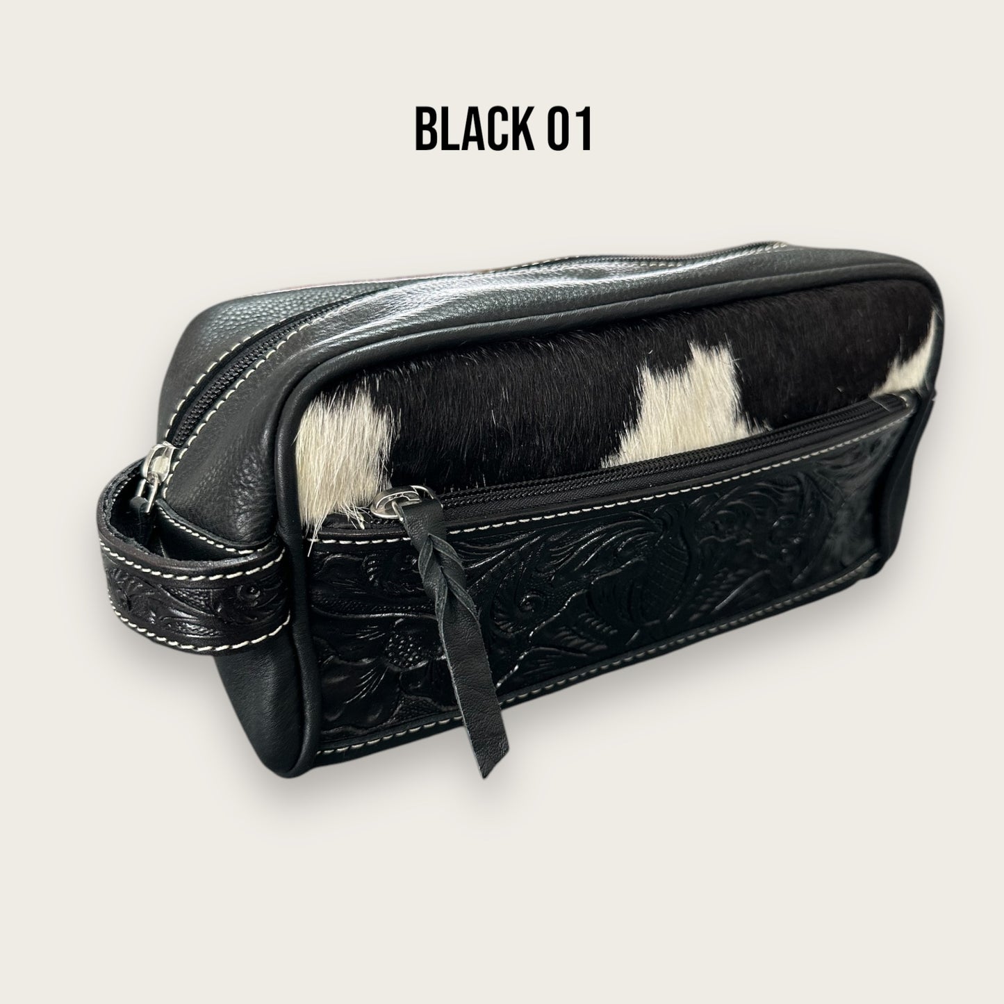 Black and White Cowhide and Leather Toiletry Bag with Tooling Details