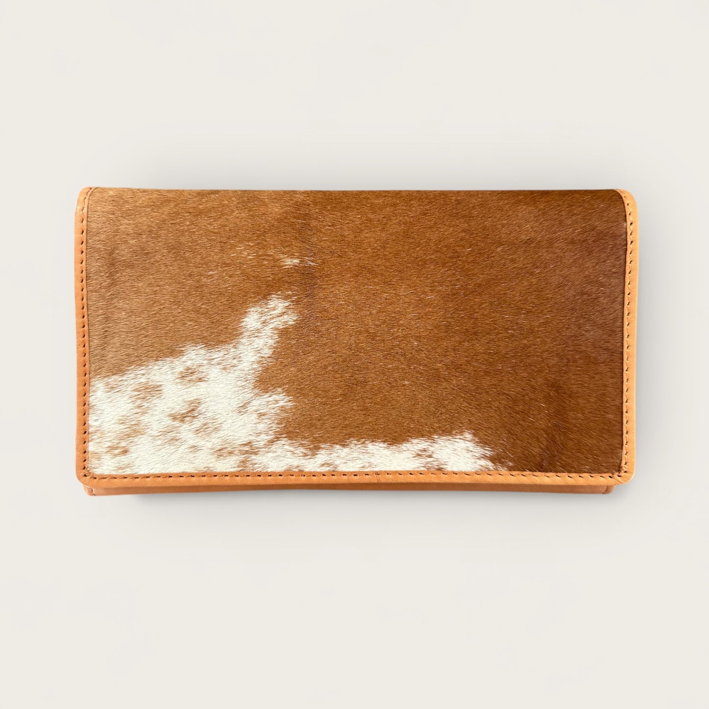 Large cowhide and leather wallet in tan and white 