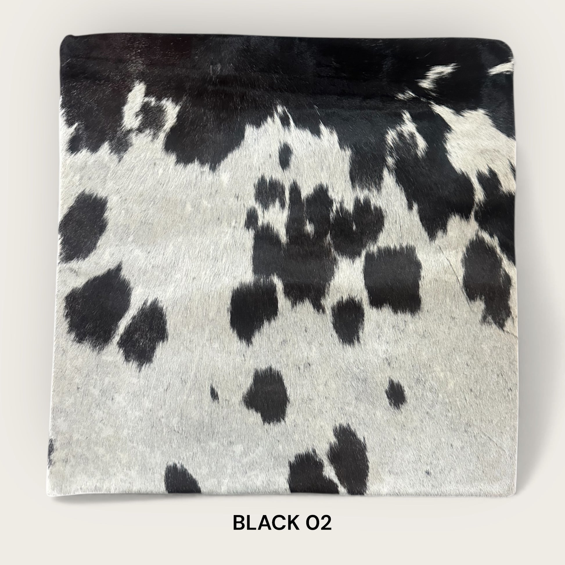 Black and white cowhide cushion 