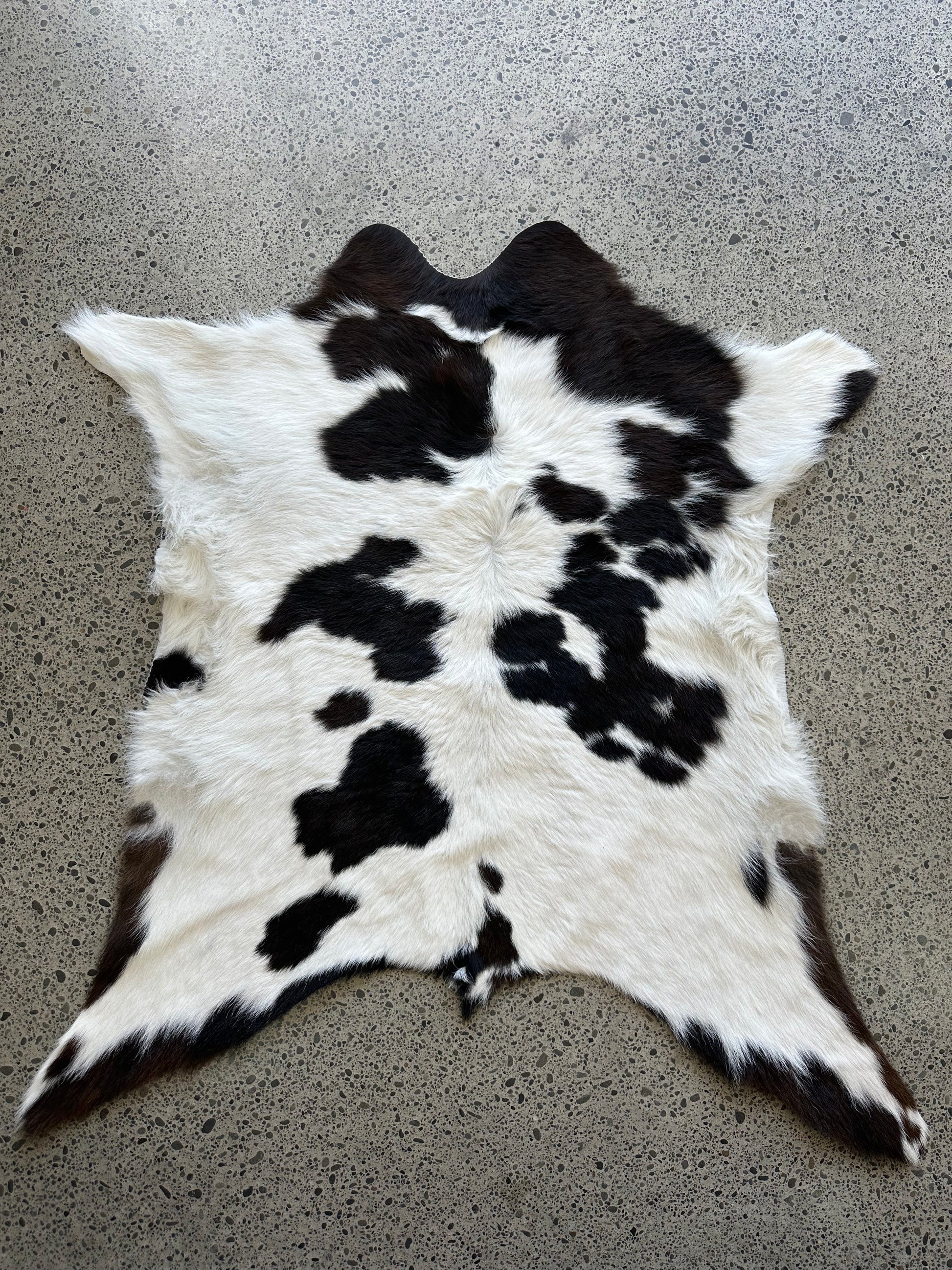 Premium calfskin in dark brown, black and white