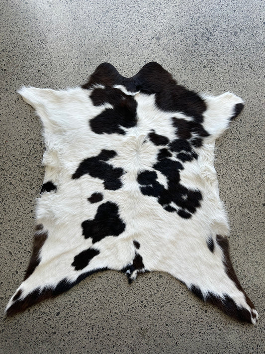 Premium calfskin in dark brown, black and white