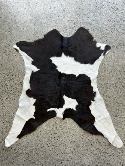 Premium calfskin in dark brown, black and white