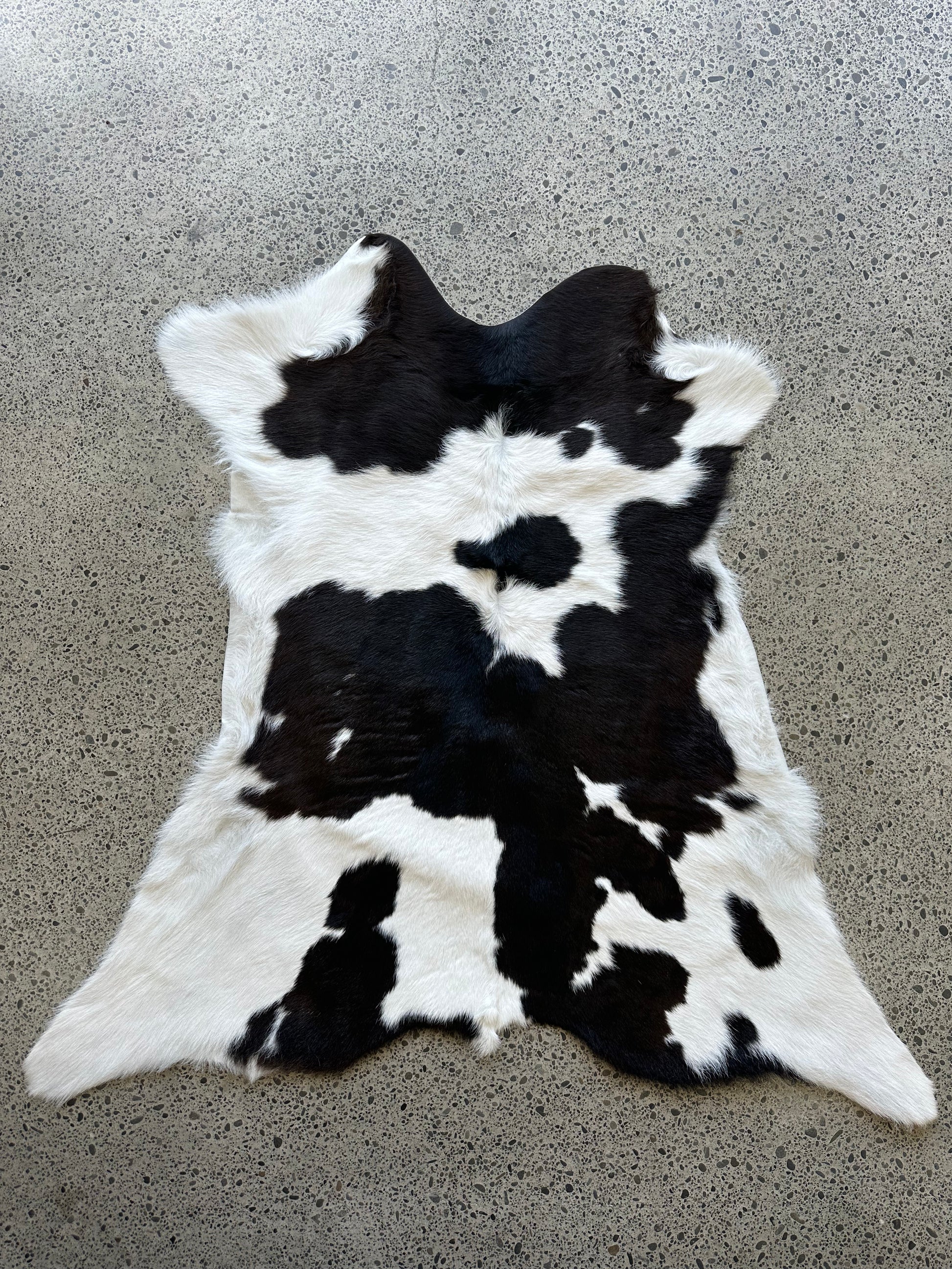 Premium calfskin in dark brown, black and white