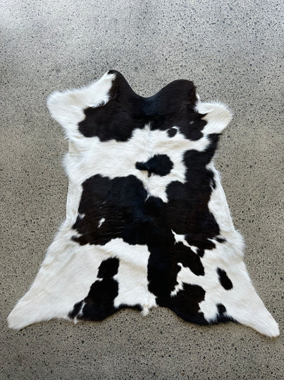 Premium calfskin in dark brown, black and white