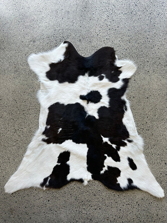 Premium calfskin in dark brown, black and white