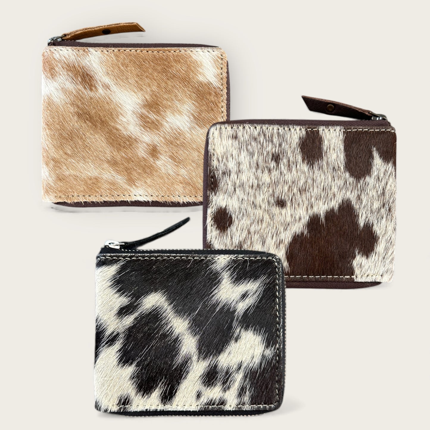 Unisex cowhide and leather wallet in tan, brown and black and white